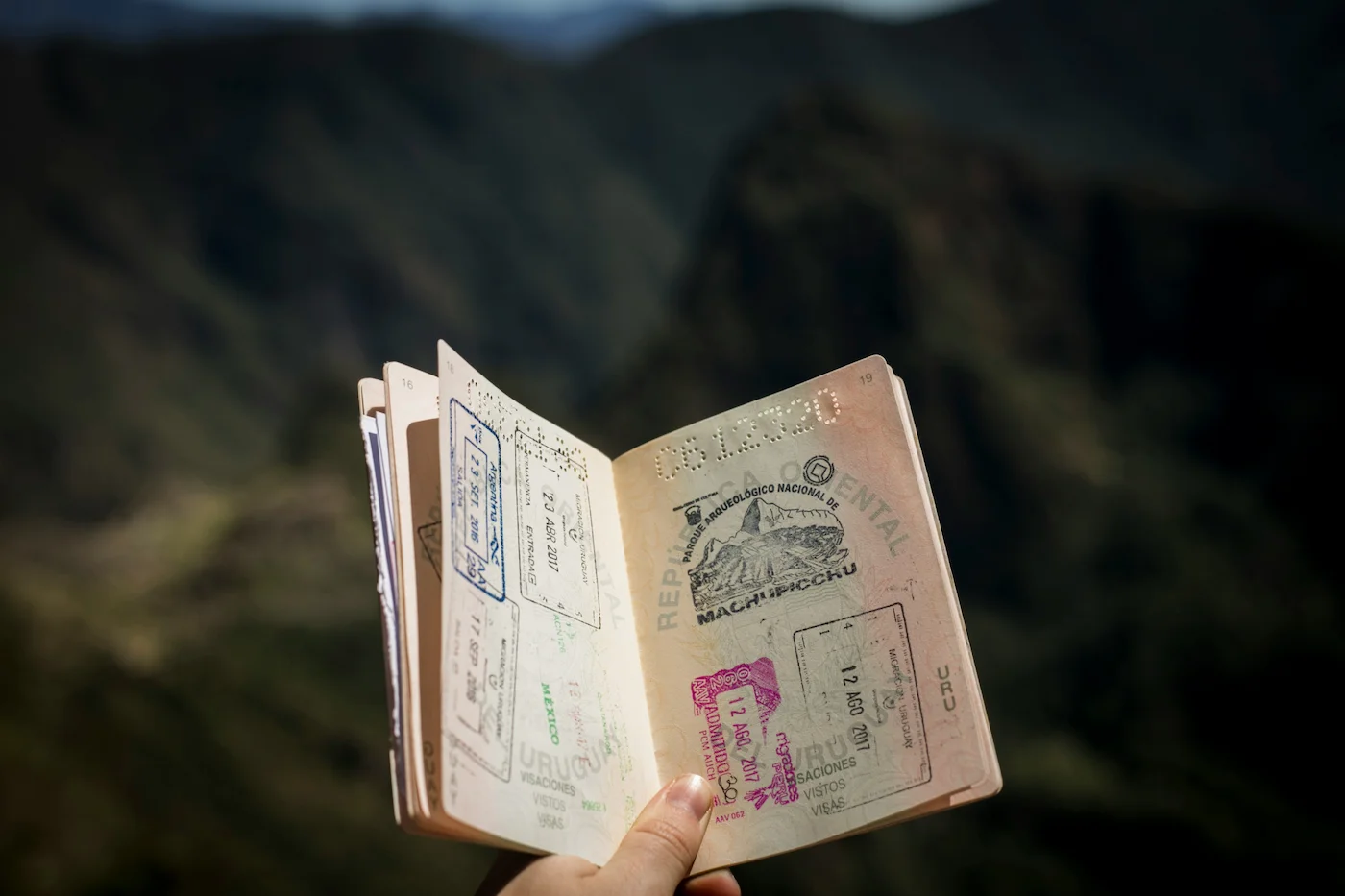 man holding his visa in hand for visa